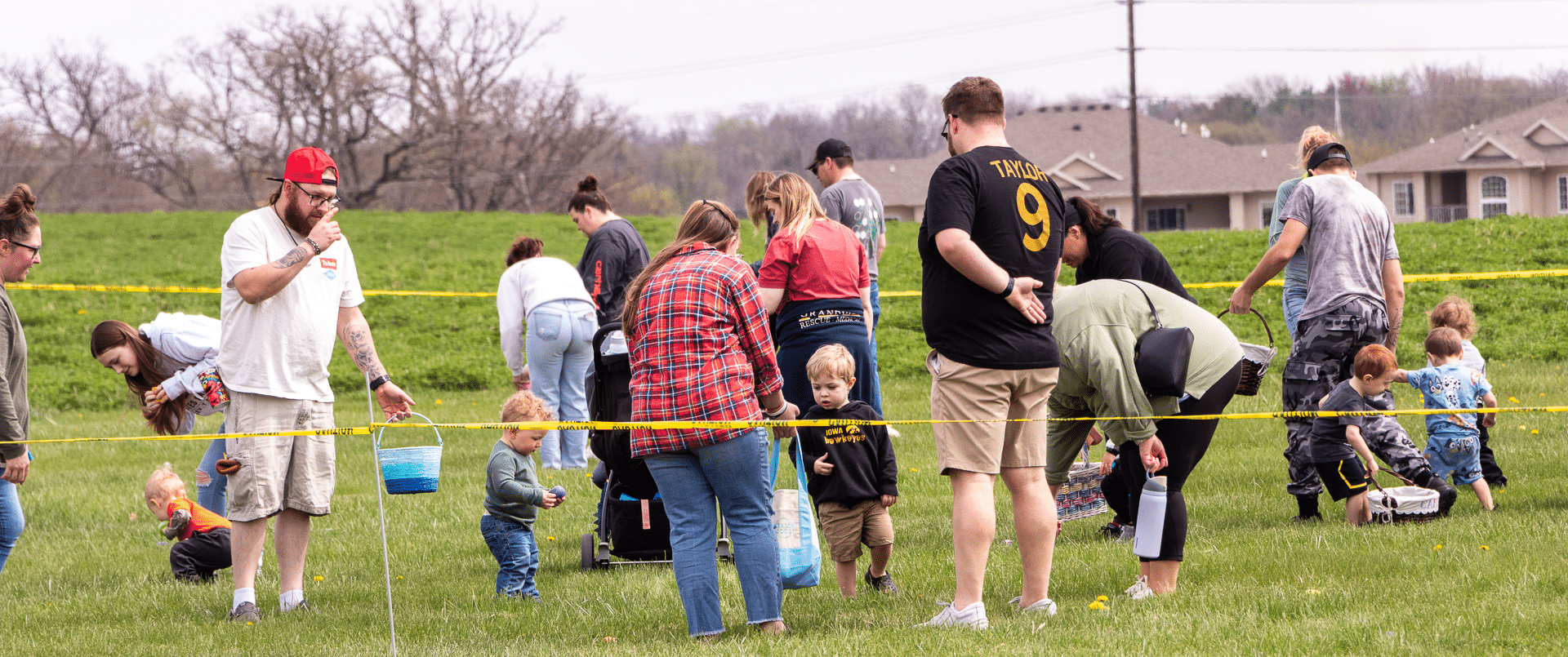 Families and friends enjoy an outdoor egg hunt together, celebrating hope and community on a sunny day. - Muscatine Church of Christ