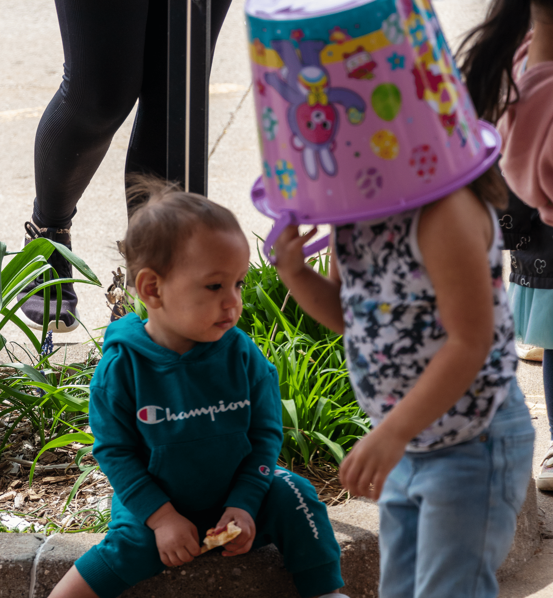 Two joyful children share laughter and food, reminding us all are welcome in God’s loving, hopeful community. - Muscatine Church of Christ